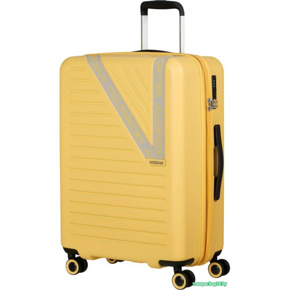 Чемодан-спиннер American Tourister Dynabelt Sunny Yellow 66 см